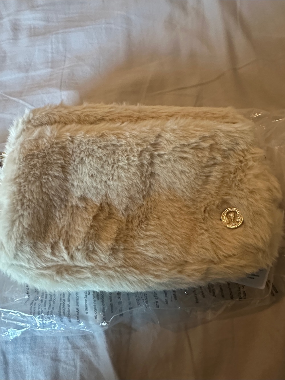 Lululemon Faux Fur Beige Wristlet Clutch with Gold Accent